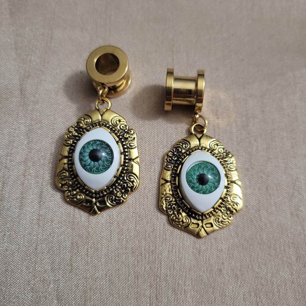 0 gauge (8mm) gold creepy eye ball stainless steel ear tunnels, screw back
